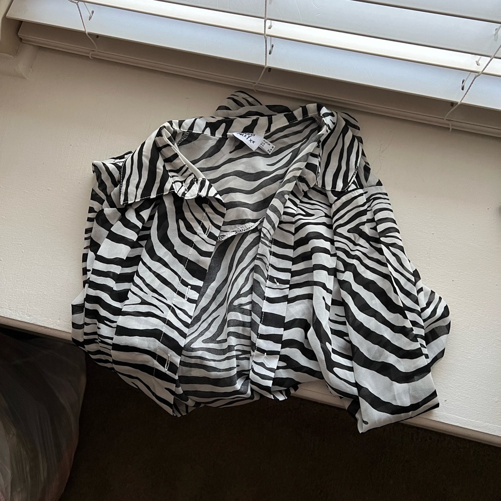 Zebra print long sleeve sheer blouse